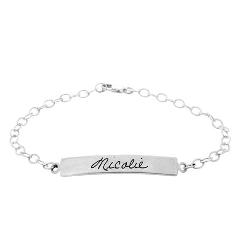 Personalized sterling silver ID bracelet engraved with an actual handwritten name