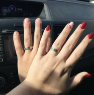 Matching sterling silver Hebrew wedding bands worn by a couple